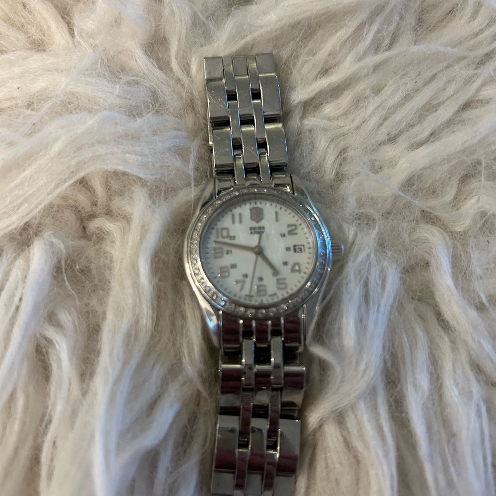 Swiss Army, mother of pearl and diamond face.